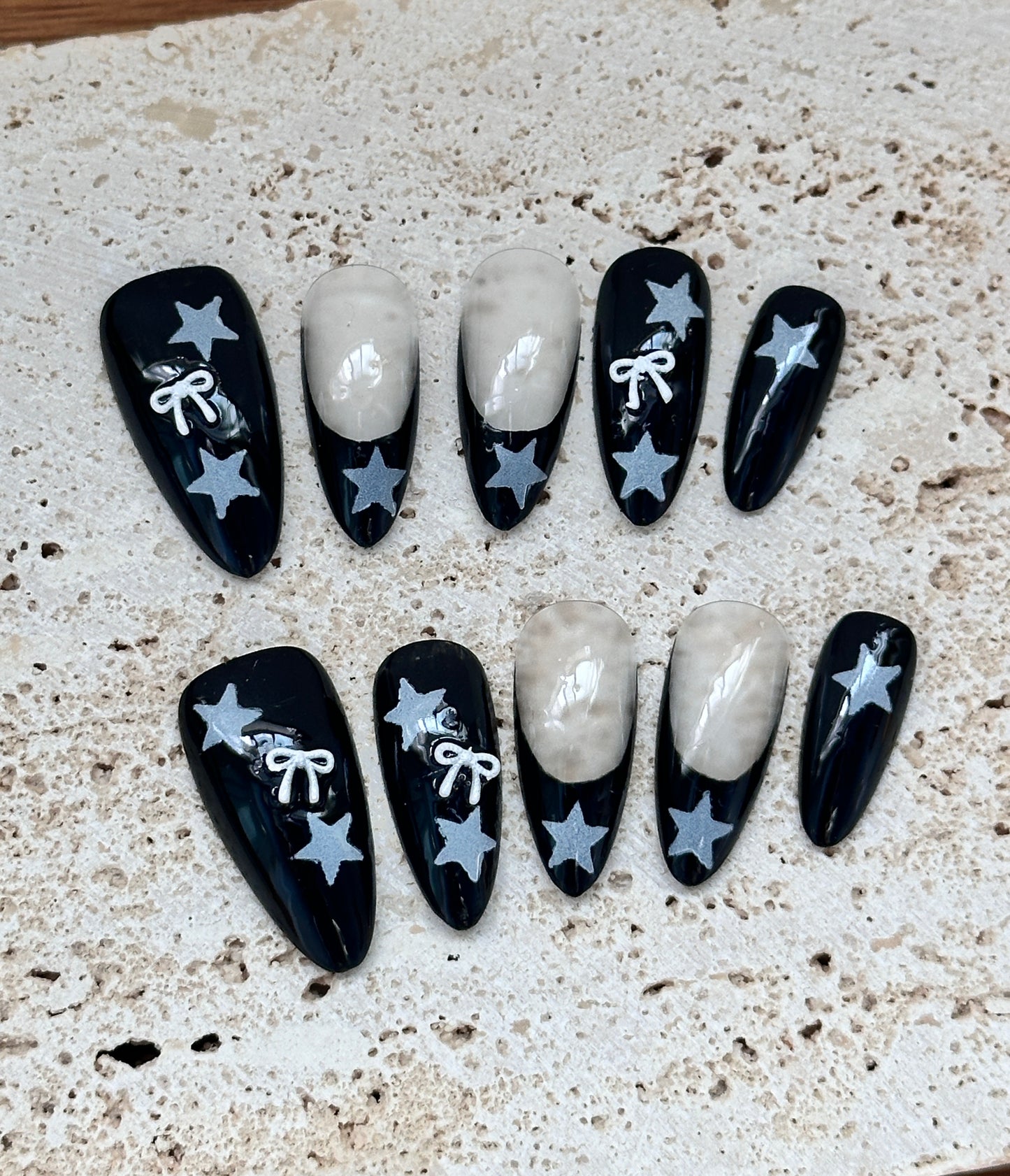 Black five-pointed star silver bow