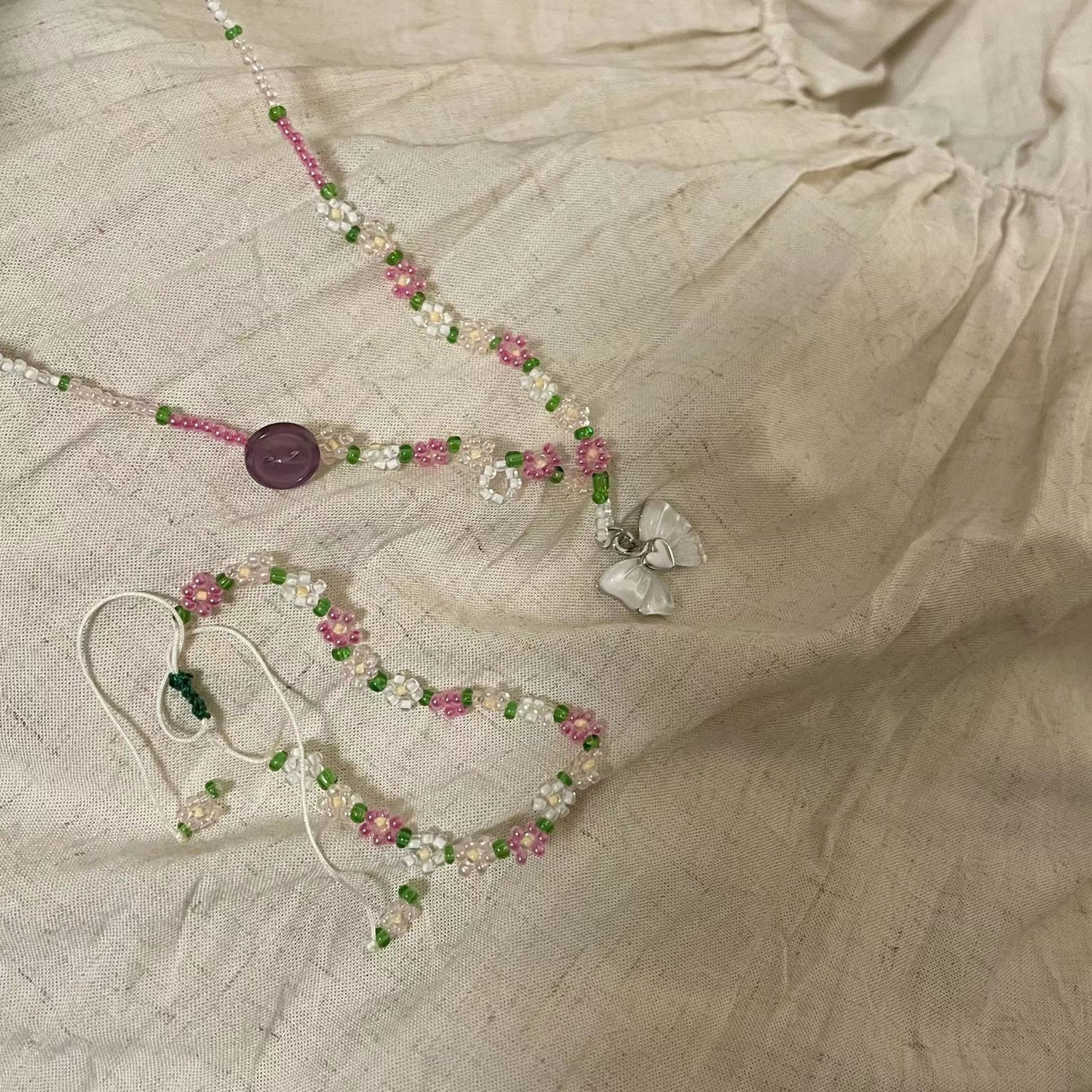 Korean version bow pendant pink flower beaded necklace white bow colored flower collarbone chain bracelet