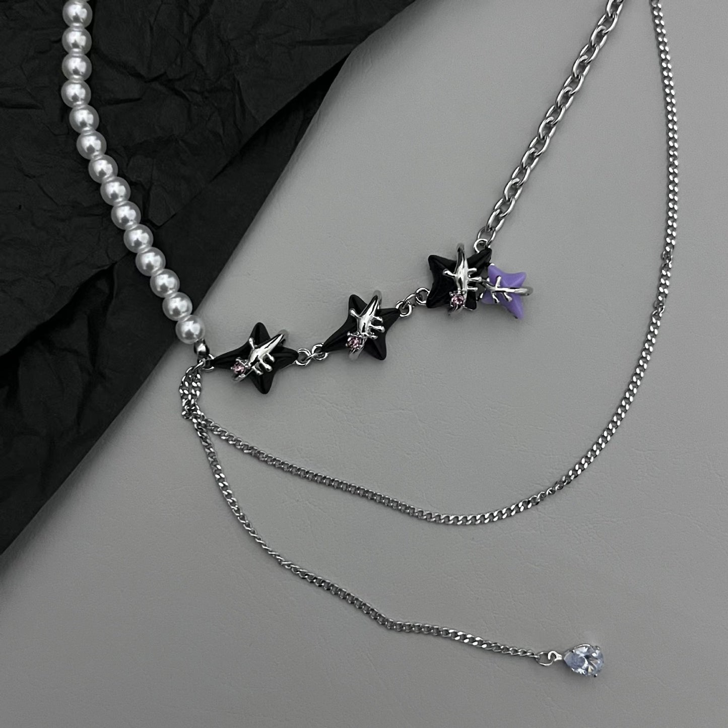 Double layered star necklace, light luxury niche, 2023 new trend, high-end design accessories, female collarbone chain earrings
