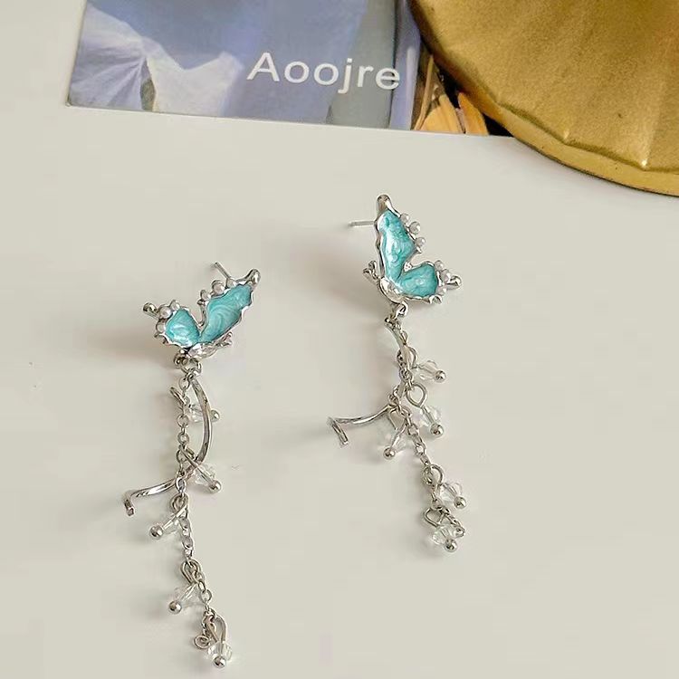 Unique crystal blue butterfly tassel long earrings, luxurious and niche earrings, 2023 new design sense earrings for women
