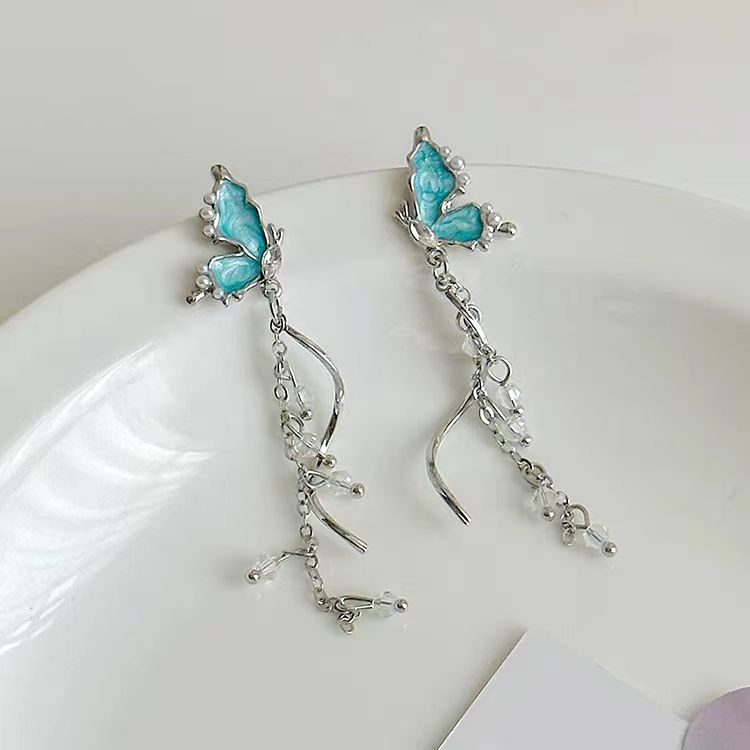 Unique crystal blue butterfly tassel long earrings, luxurious and niche earrings, 2023 new design sense earrings for women