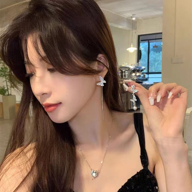 S925 Silver Needle Asymmetric Butterfly Earrings with Light Luxury and Small Design Sense High Grade Earstuds for Women without Ear Holes Earclip Earrings