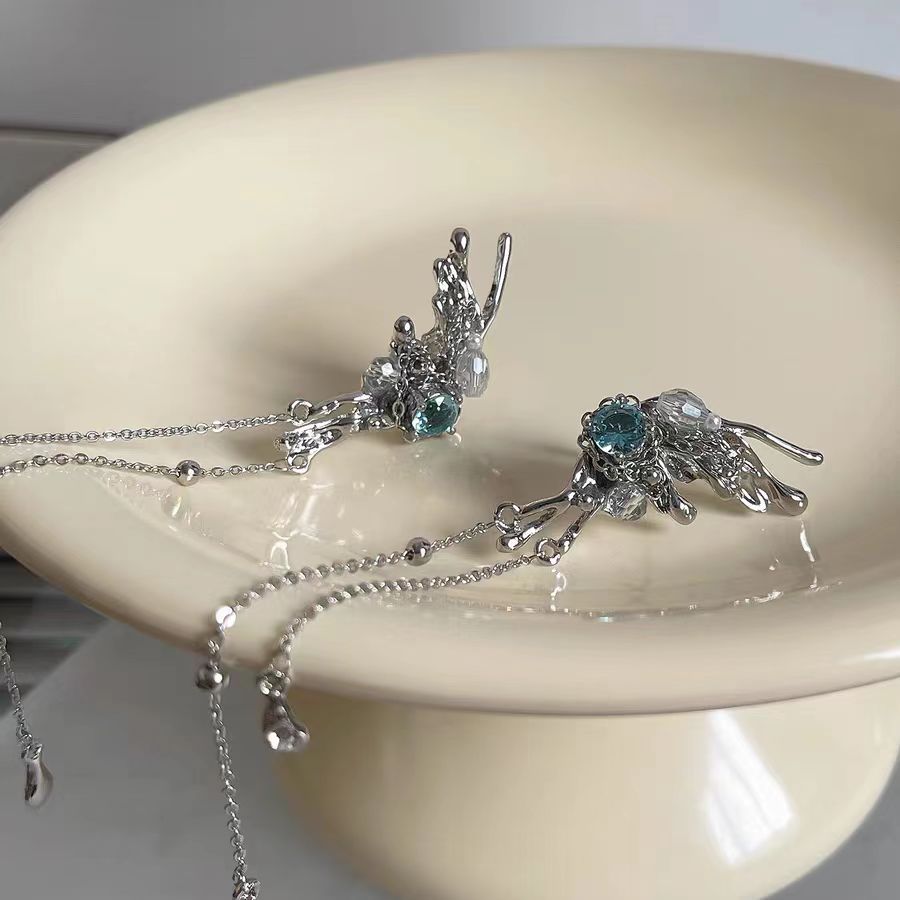 No need for ear holes, ear bones, elf ears, asymmetric butterfly blue zircon handcrafted design, niche design, long and slim tassels