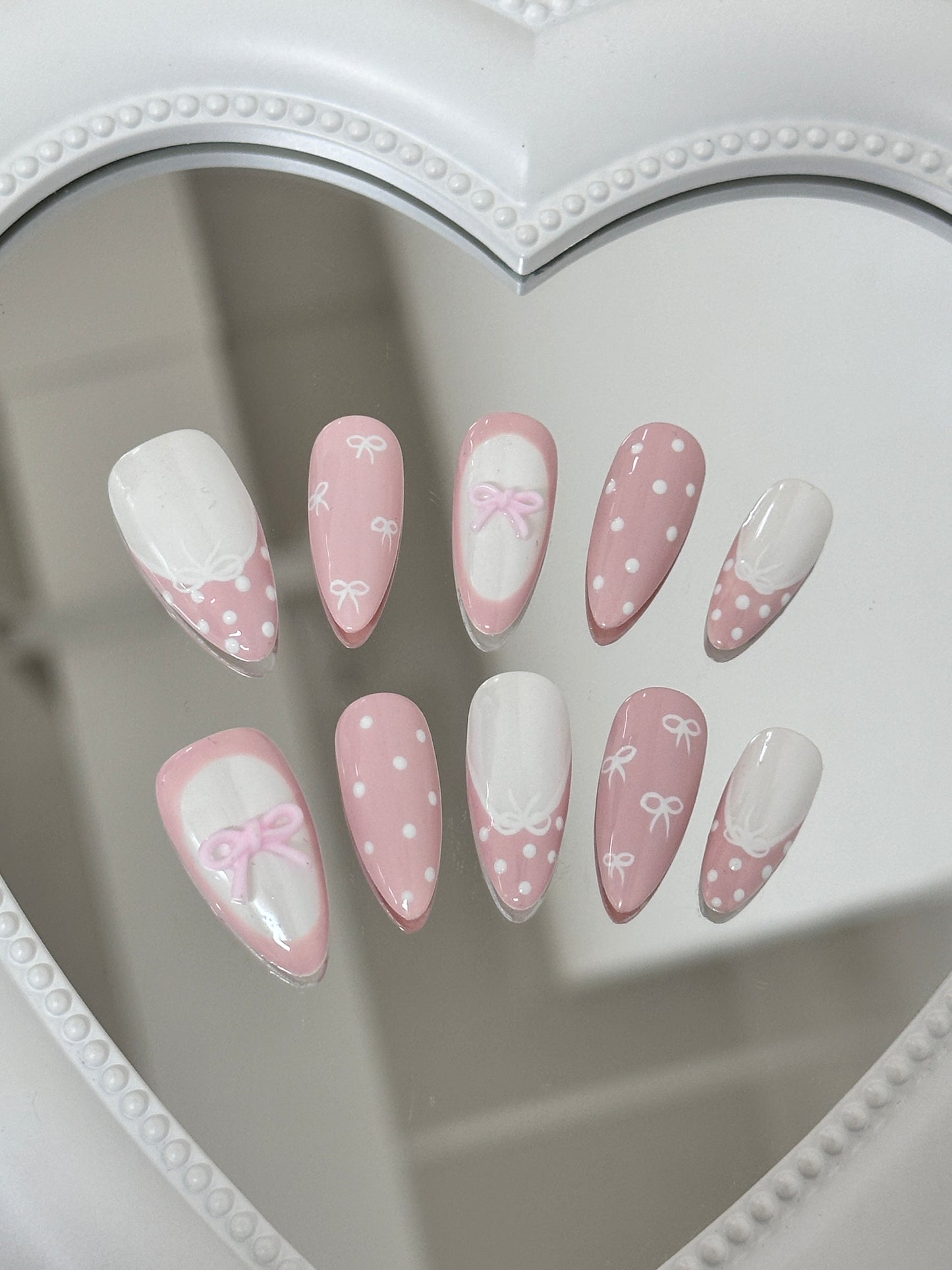 Enchanting Pink Bow Nail Art