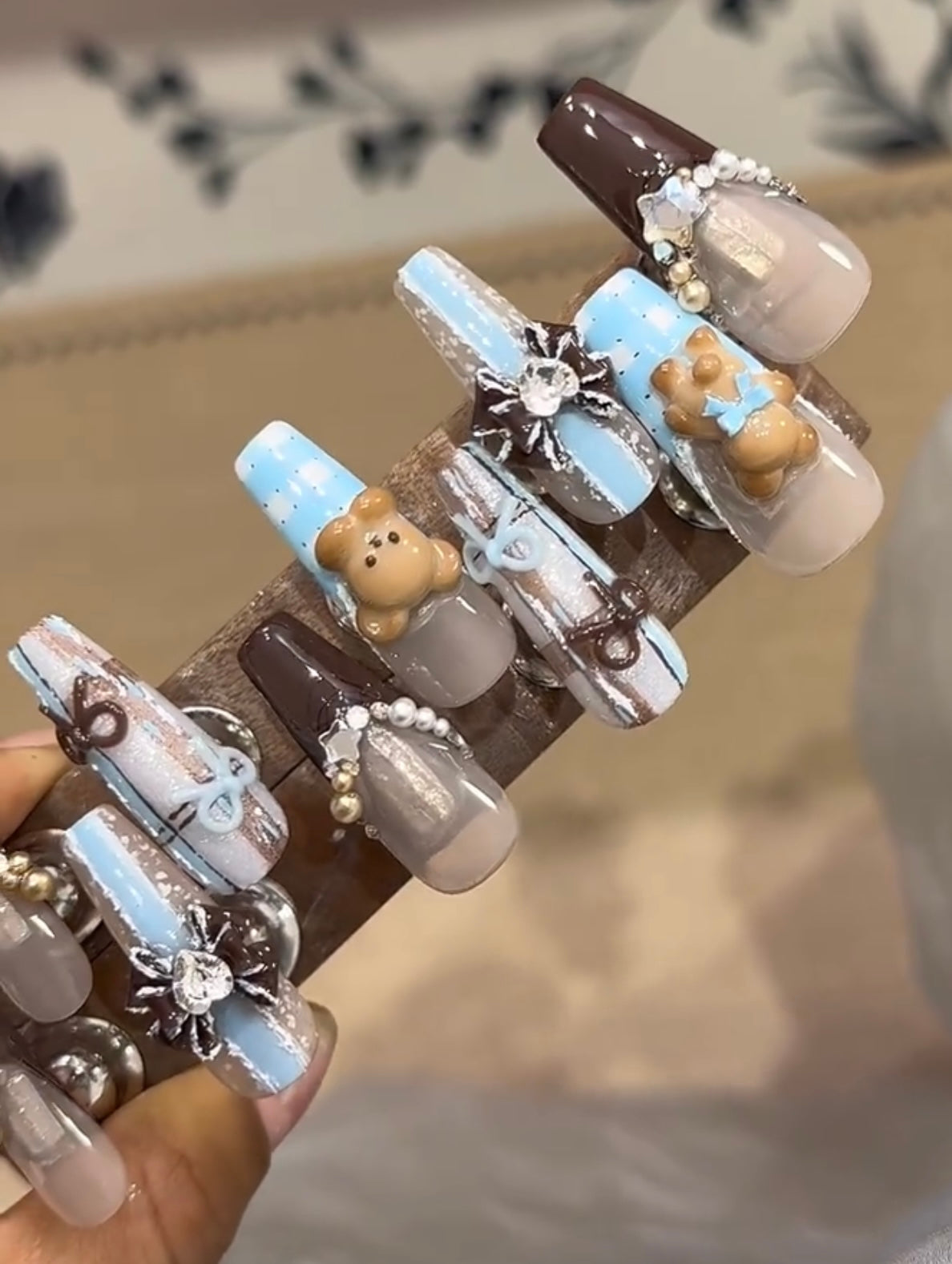Brown bow melancholy bear nails