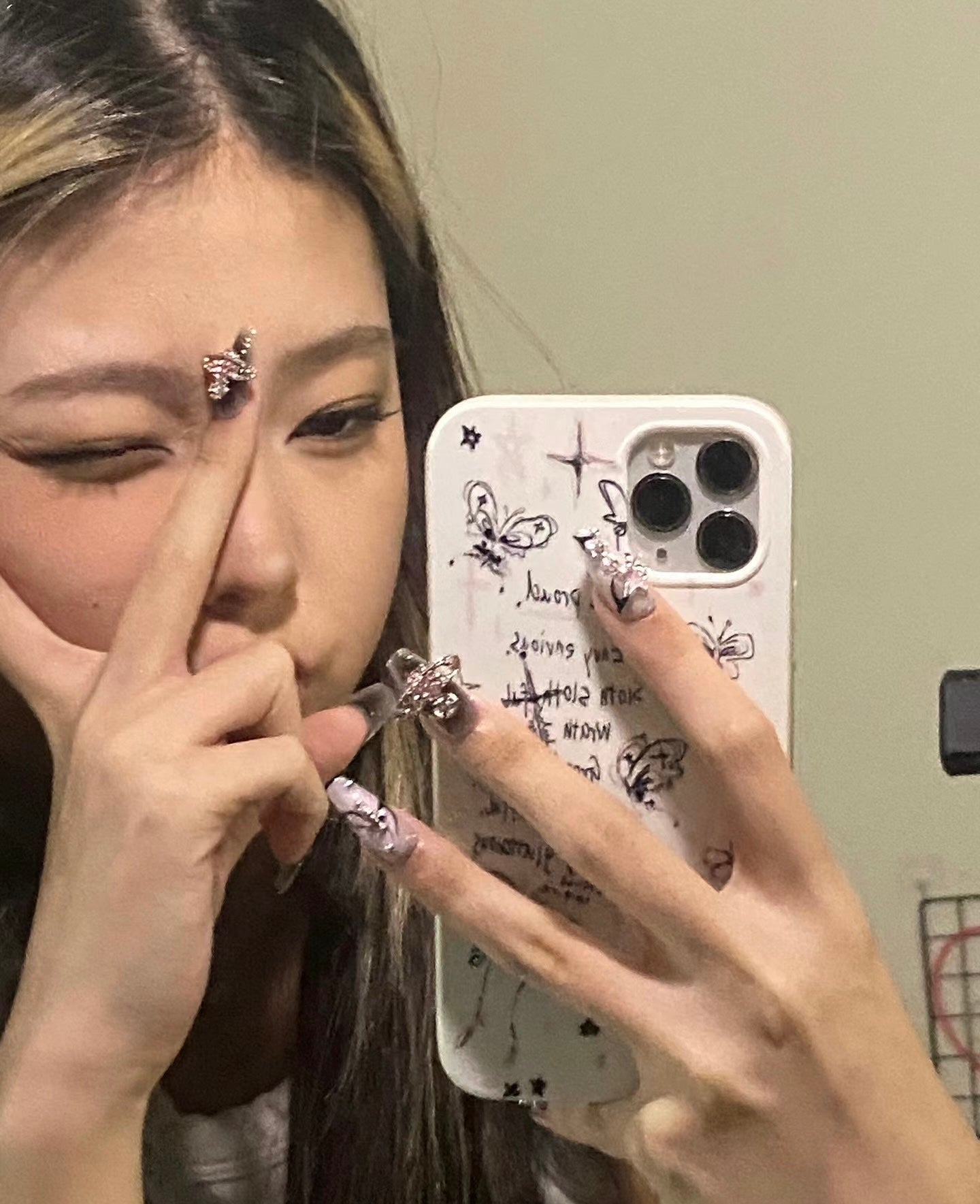 "Cosmic Elegance: Glittering Orbit & Star Nail Design"