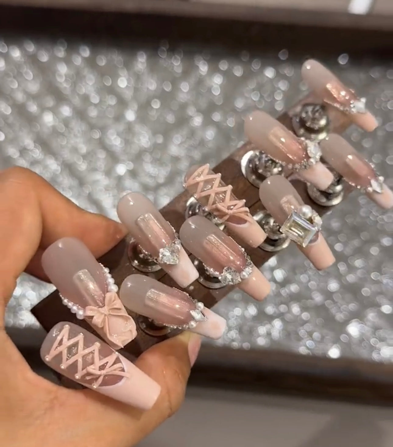 Swarovski pink strap bow nails