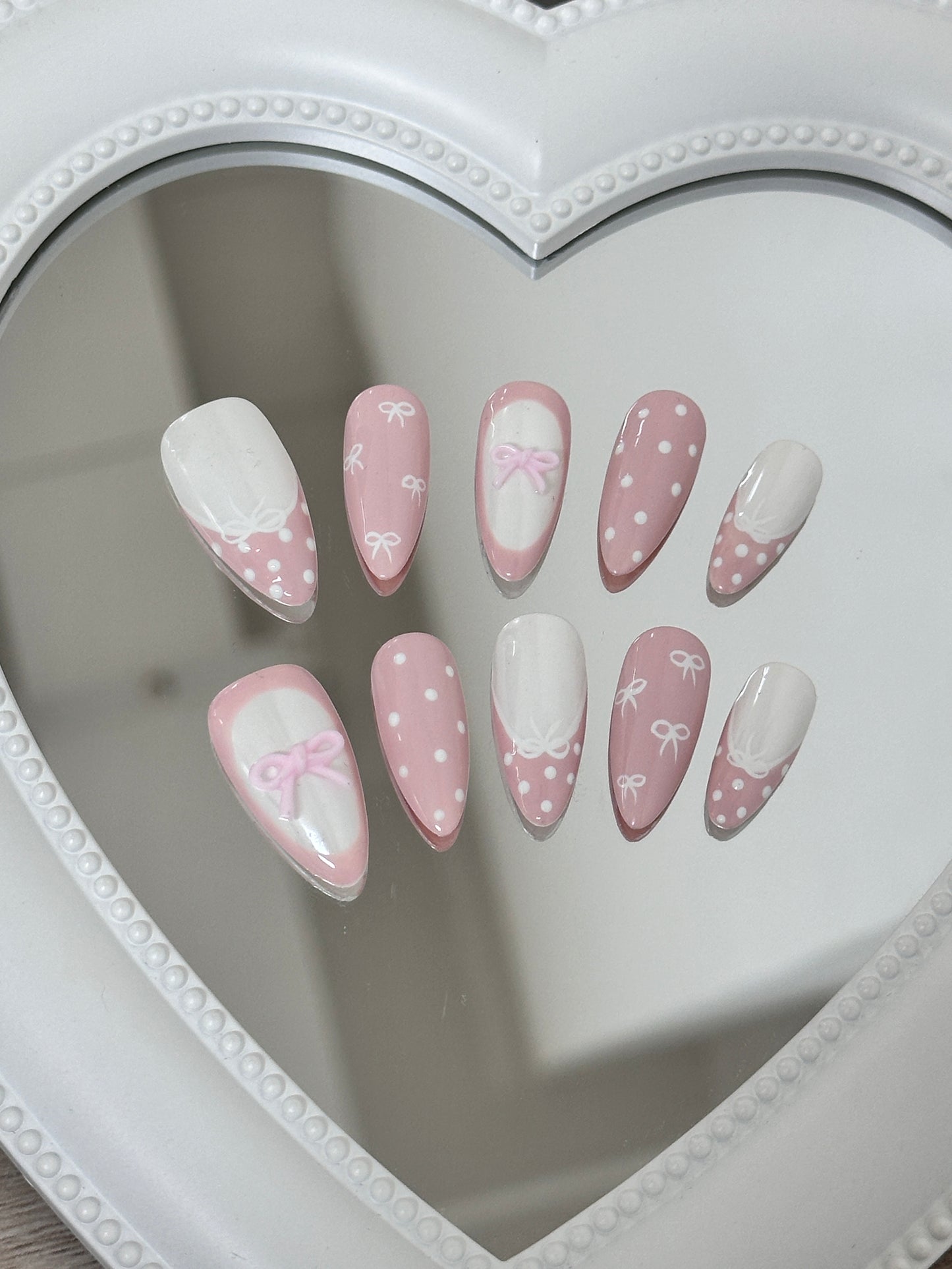 Enchanting Pink Bow Nail Art
