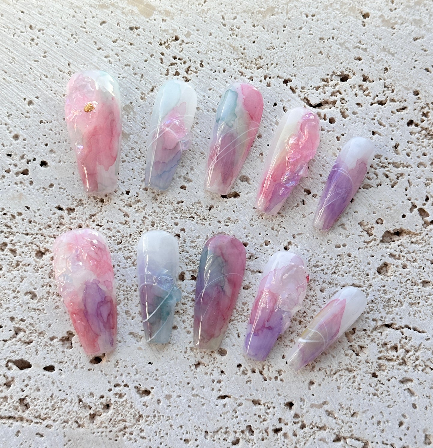Clouds and mist stain the nails.