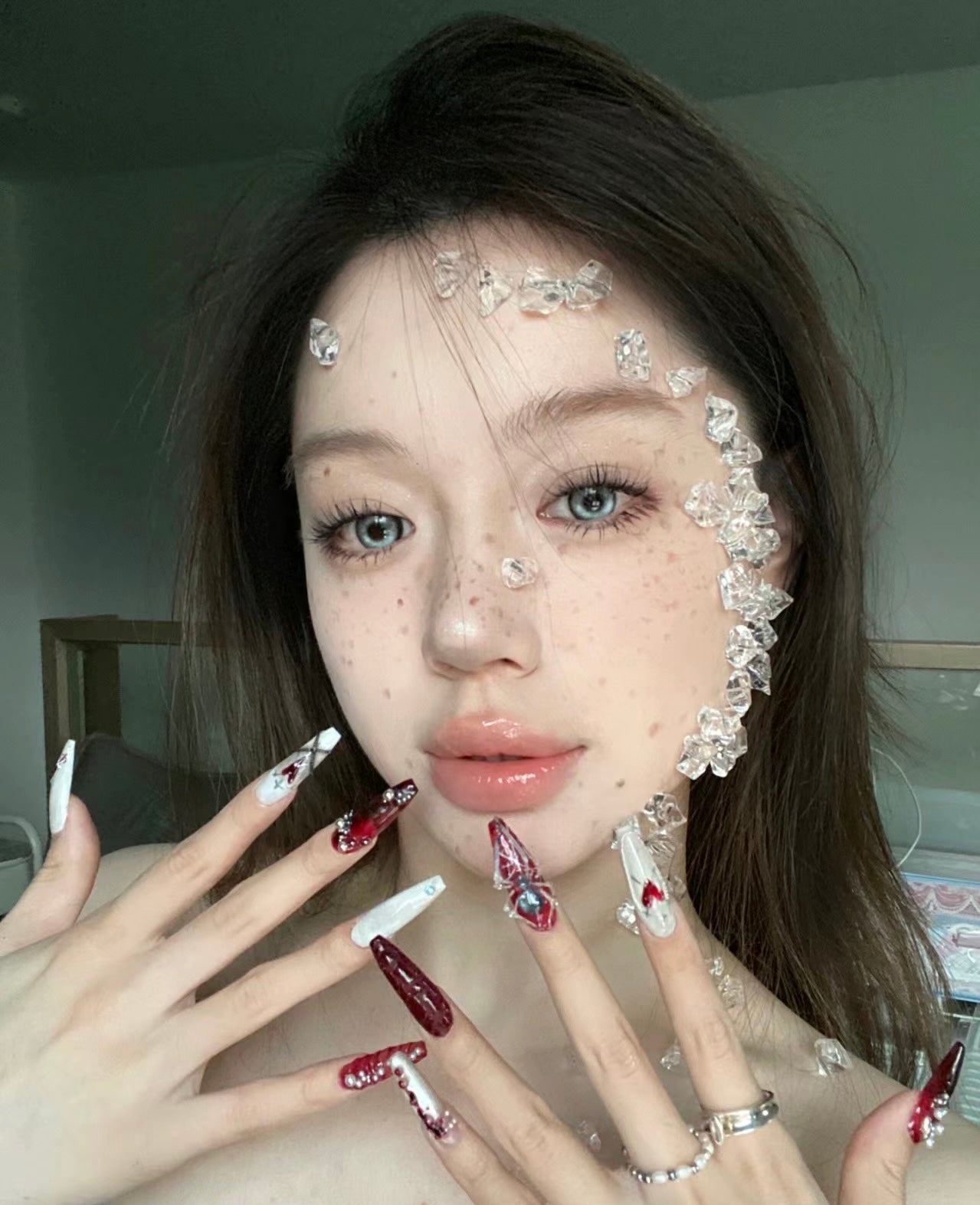 "Gothic Elegance: Dark Red and White Nail Art with 3D Embellishments"