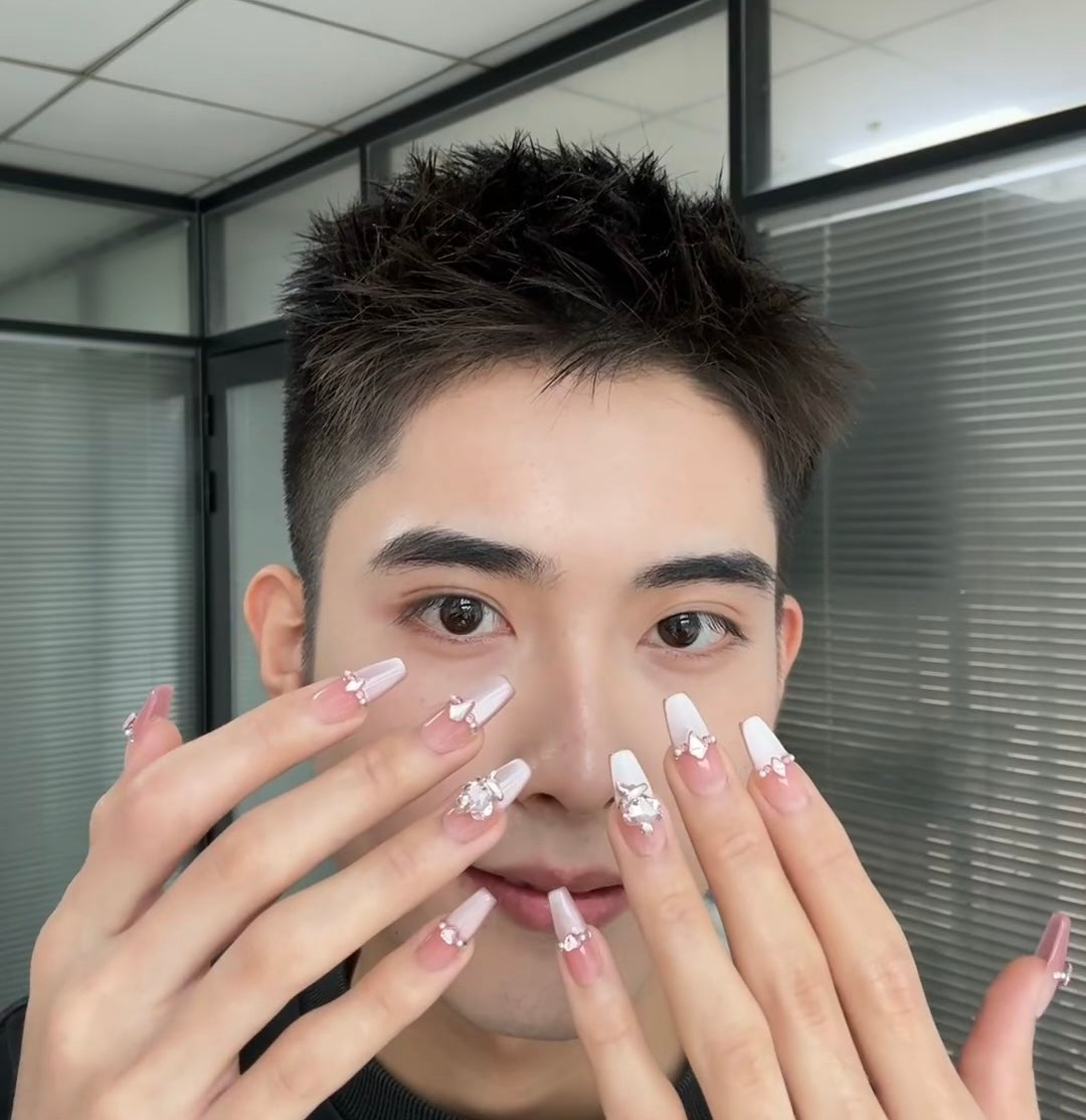 Elegant Pink French Manicure with 3D Gem Accents