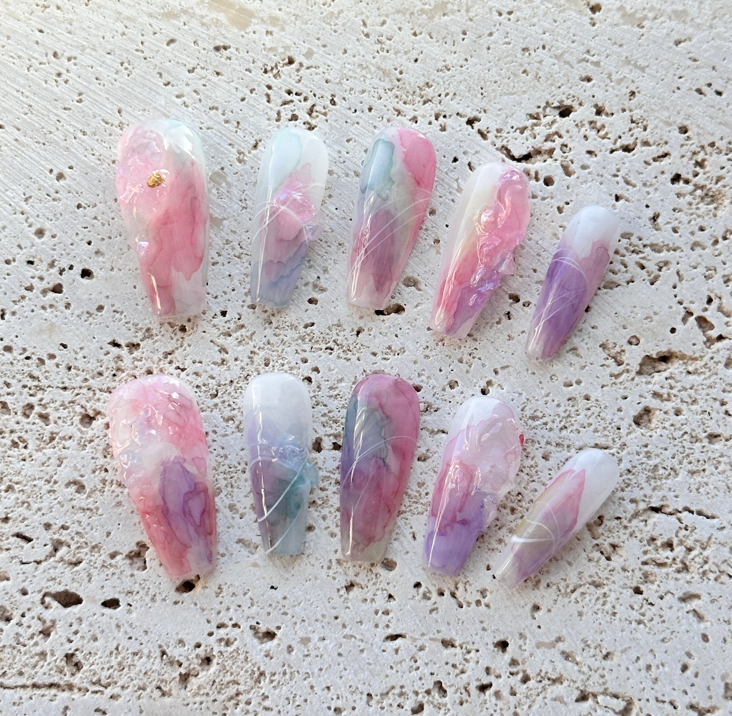 Clouds and mist stain the nails.