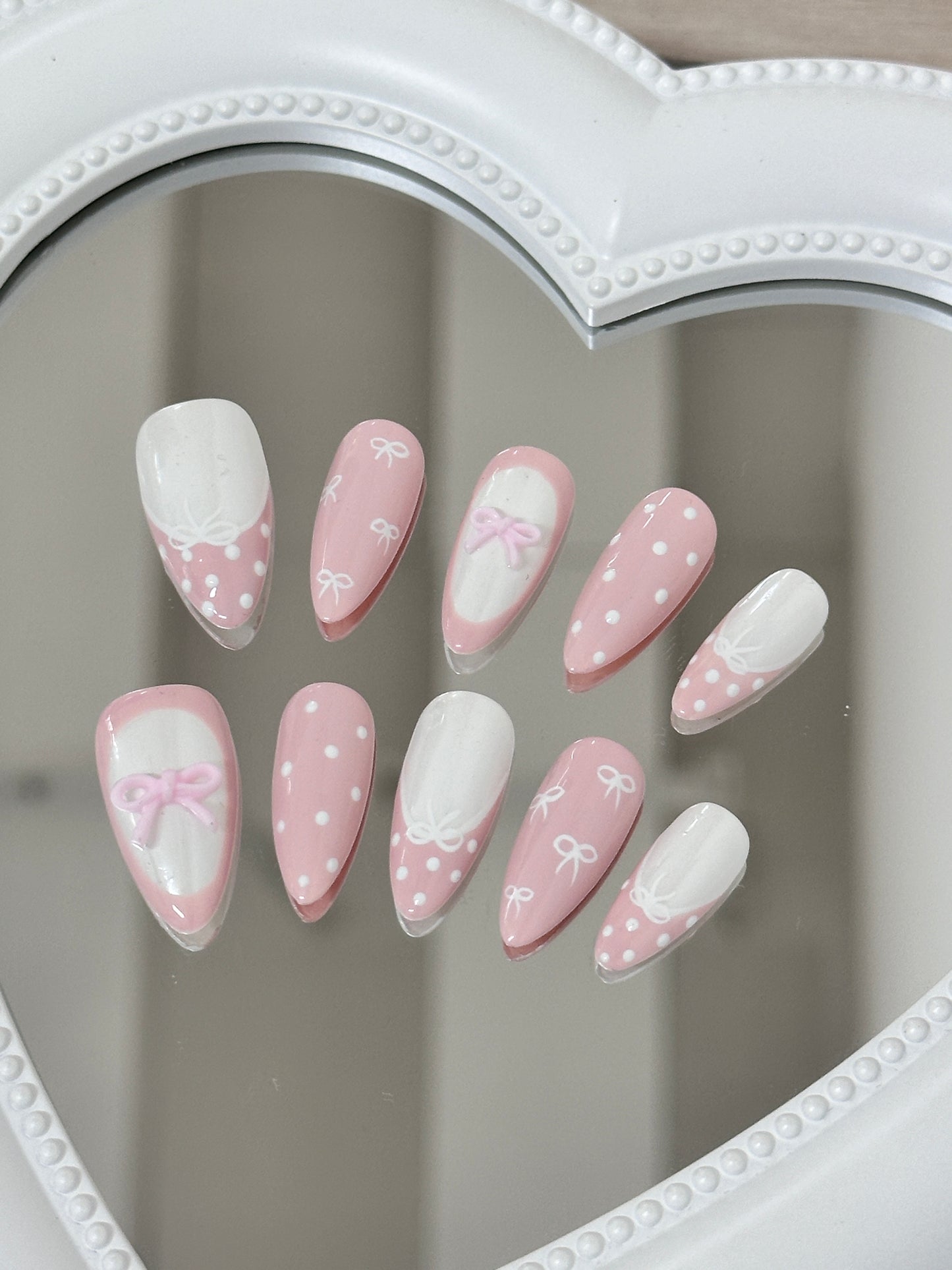 Enchanting Pink Bow Nail Art
