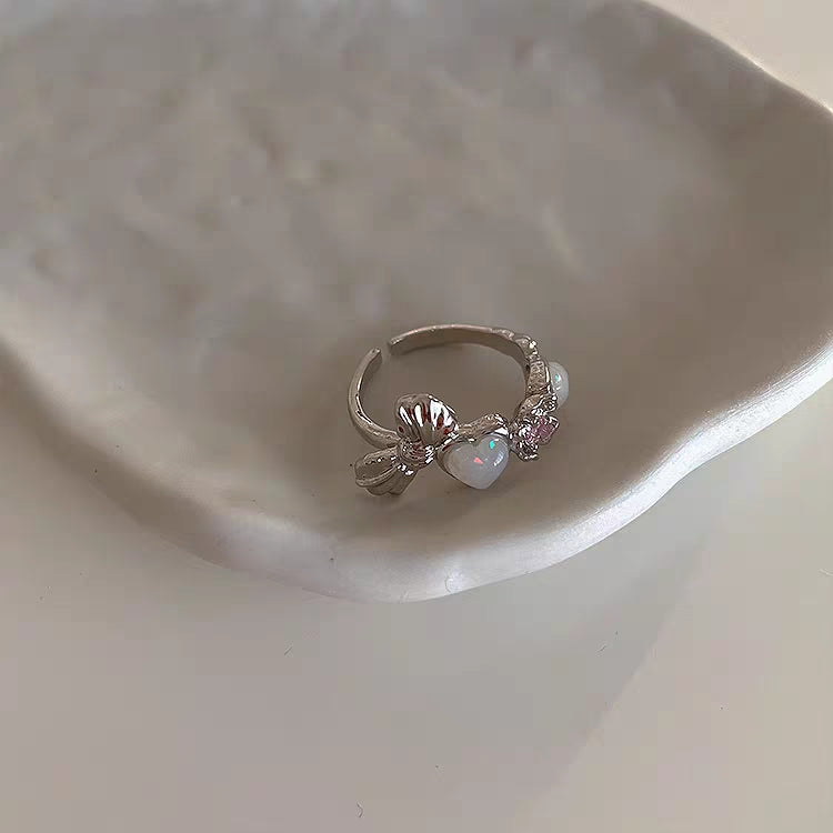 A niche design with irregular metal cat's eye stone heart opening ring for women's retro personality and minimalist temperament ring