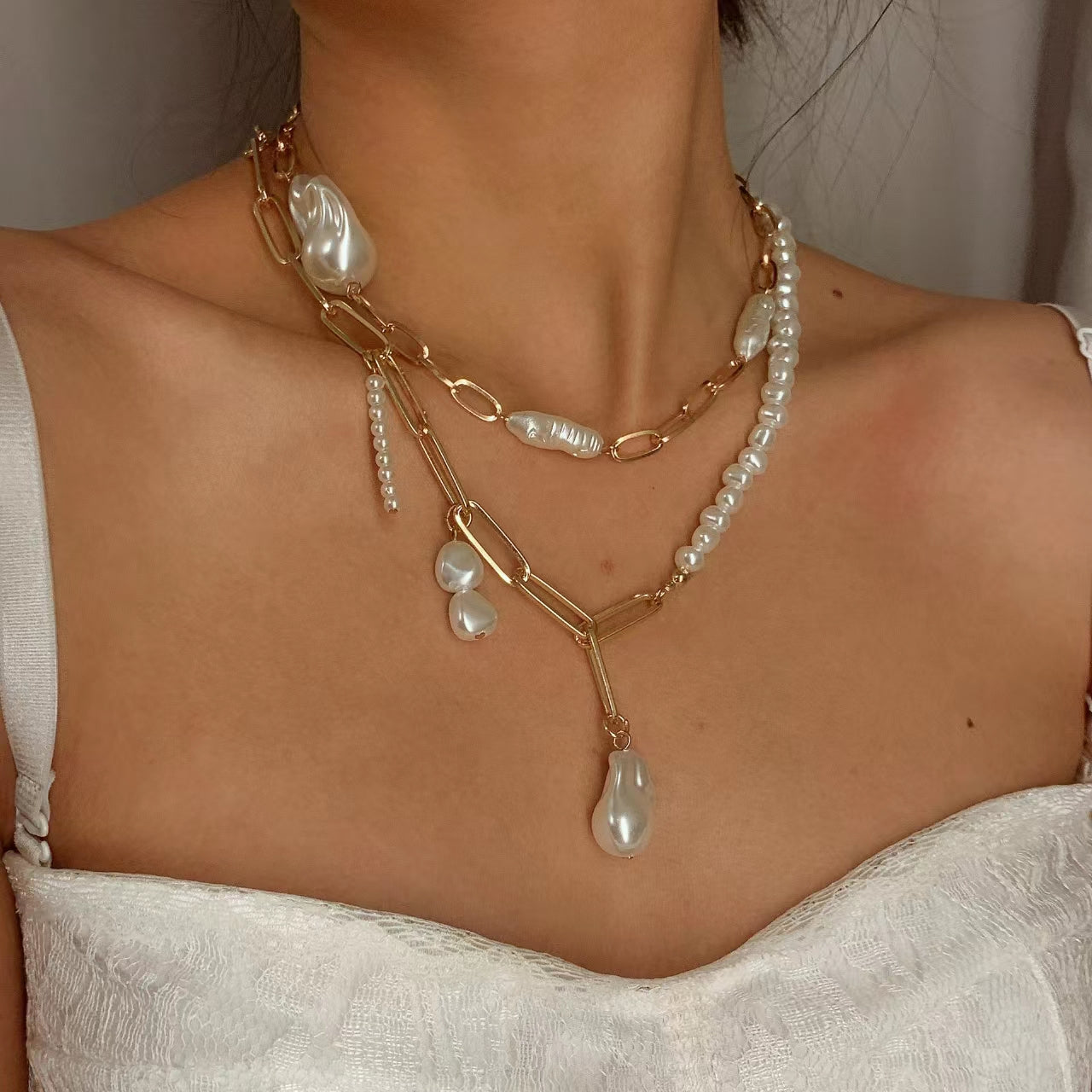 Golden multi-layered pearl necklace