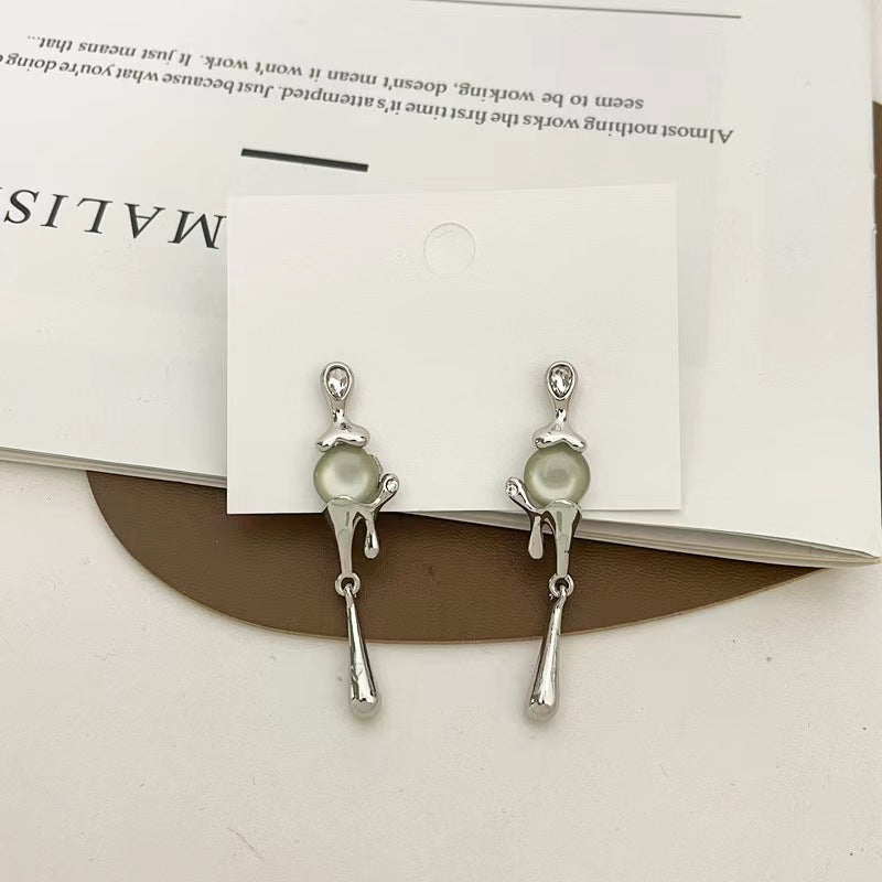 925 silver pin French cat's eye tassel niche design lava earrings long personalized aloof wind earrings female