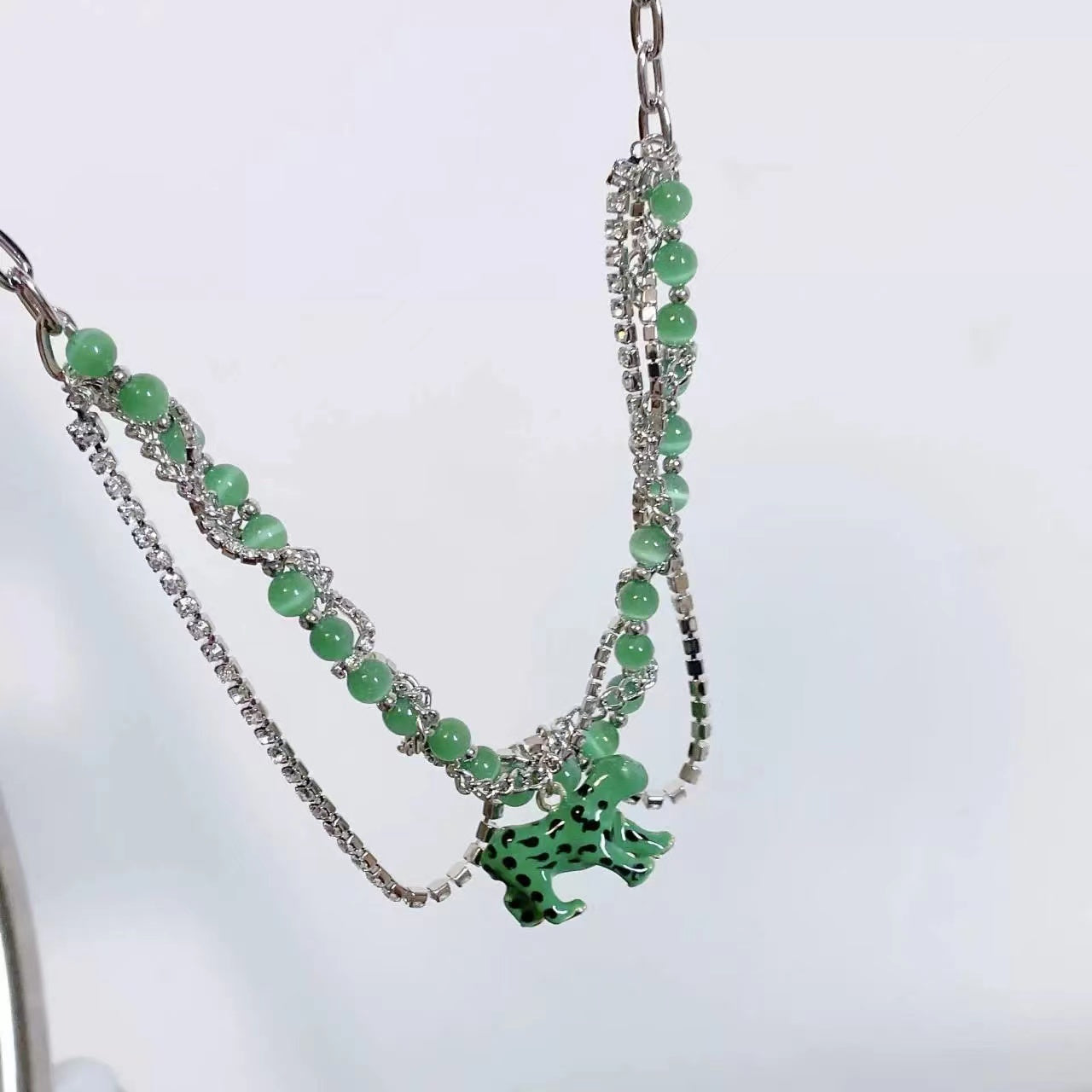 Green leopard diamond necklace