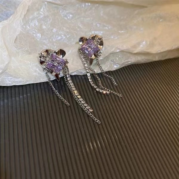 Silver pin ruffled geometric tassel earrings with diamonds