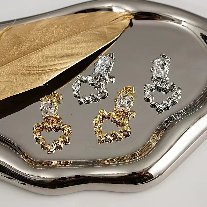 design twisted metal zircon 18k gold earrings South Korea autumn and winter hundred with earrings