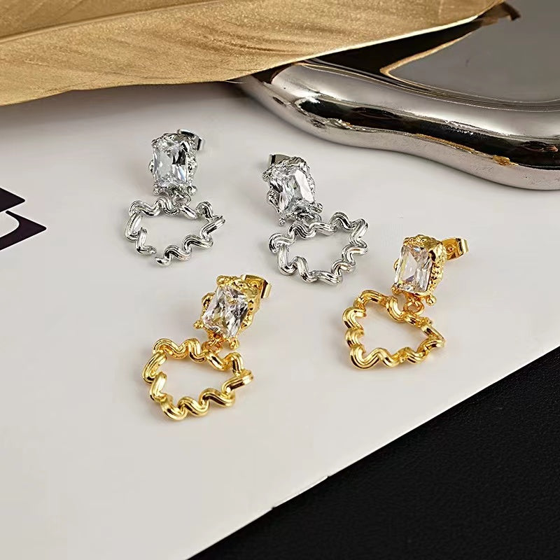 design twisted metal zircon 18k gold earrings South Korea autumn and winter hundred with earrings