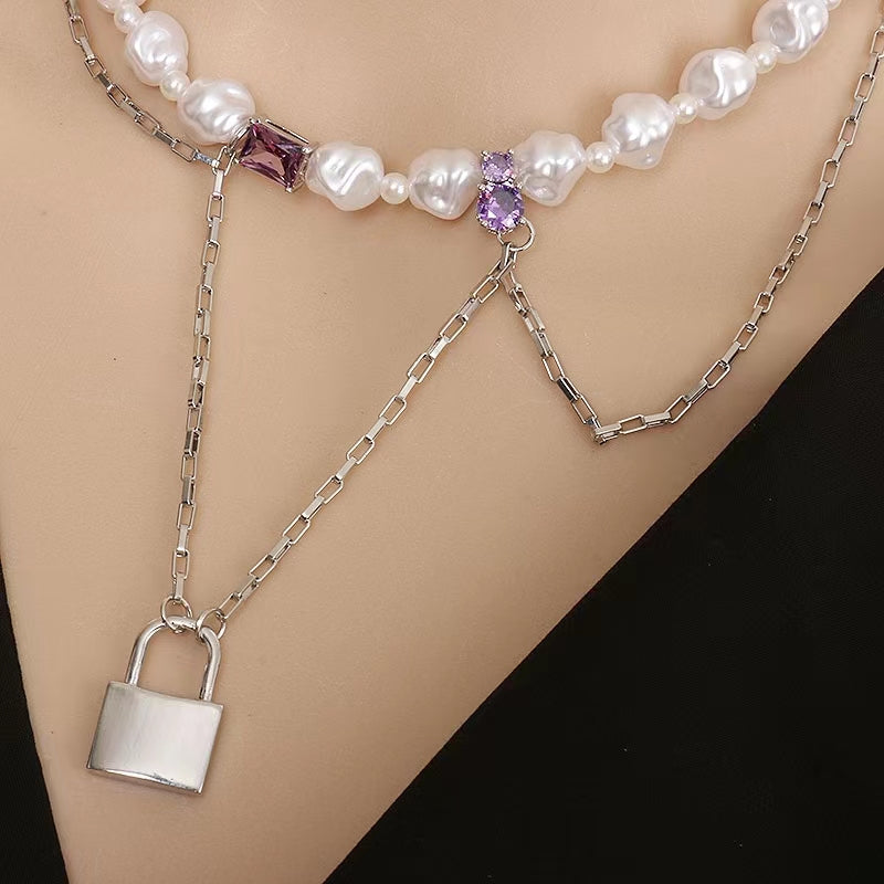 French light luxury designer shaped pearl necklace high sense metal tassel chain lock pendant sweater chain