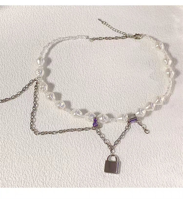 French light luxury designer shaped pearl necklace high sense metal tassel chain lock pendant sweater chain
