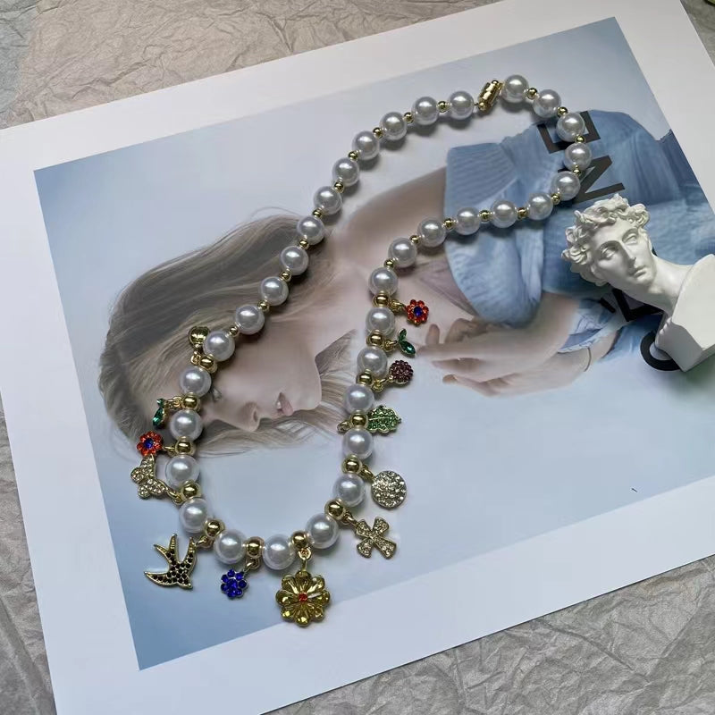 Sweet cool garden series swallow beetle butterfly flower diamond pearl necklace high sense clavicle chain magnetic buckle neck chain