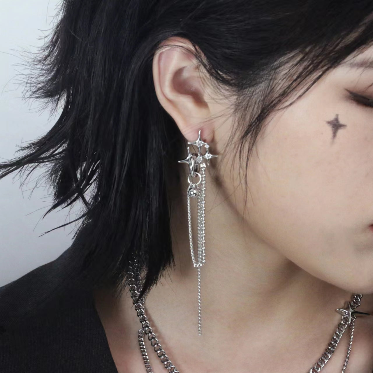 Original design star tassel asymmetric earrings female senior retro exaggerated unique minority