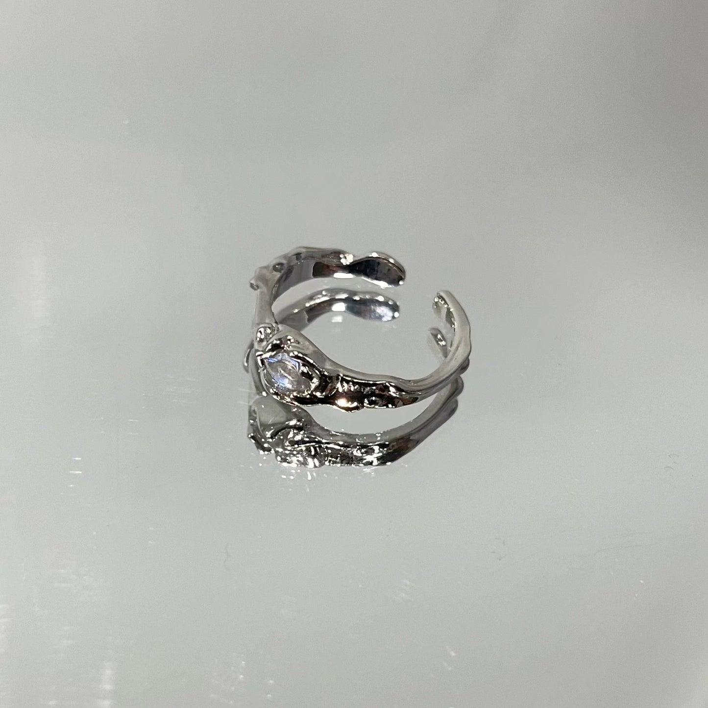 Zirconia and diamond geometric ruffle ring