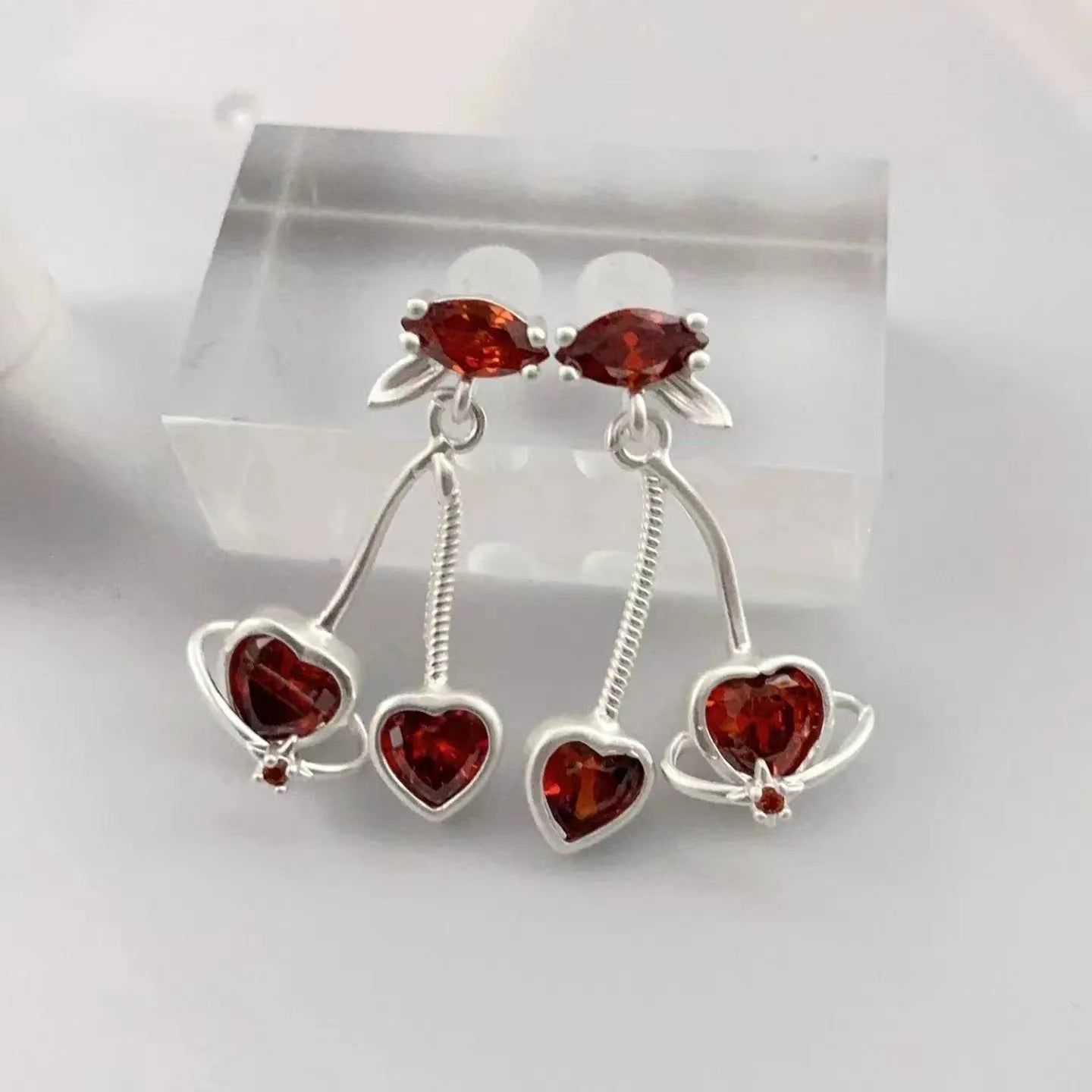 Red cherry earrings with a premium feel