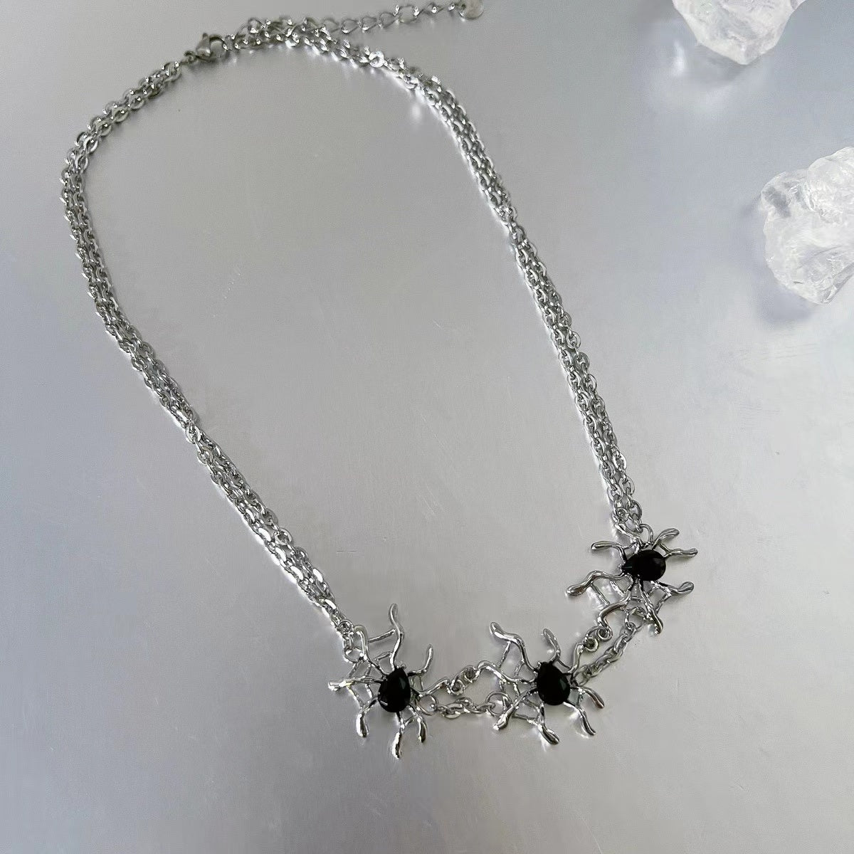 Liquid spider web tassel necklace
