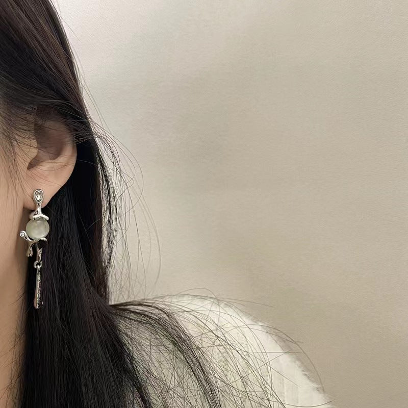 925 silver pin French cat's eye tassel niche design lava earrings long personalized aloof wind earrings female