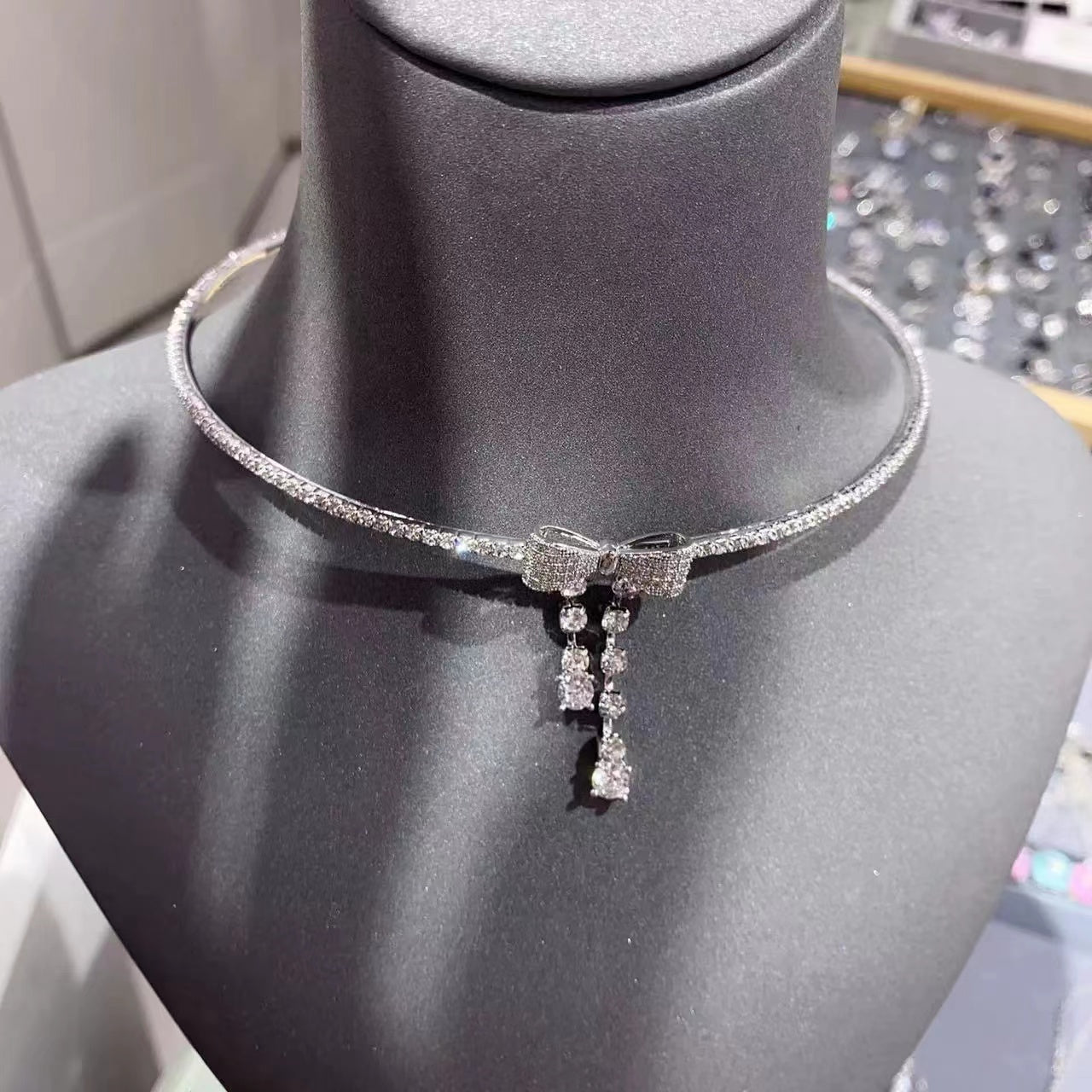 Diamond bow drop collar necklace