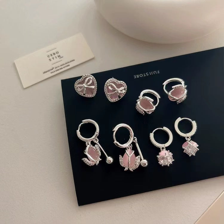Niche design sense cat's eye stone tulip zircon earrings female vintage personality simple and matching temperament stud earrings
