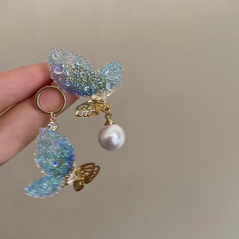 Super fairy cute pink butterfly pearl earrings female Japanese and Korean design senior sense niche earrings earrings summer
