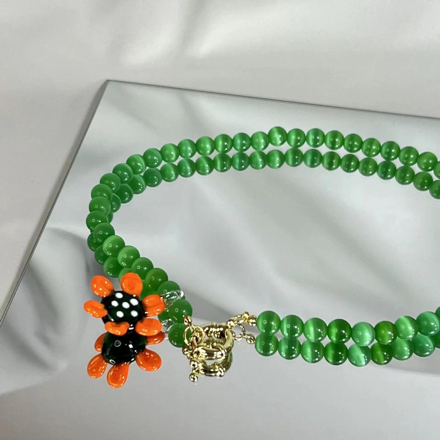 Craftworks cat's eye stone resort style handmade glass colorful flower necklace