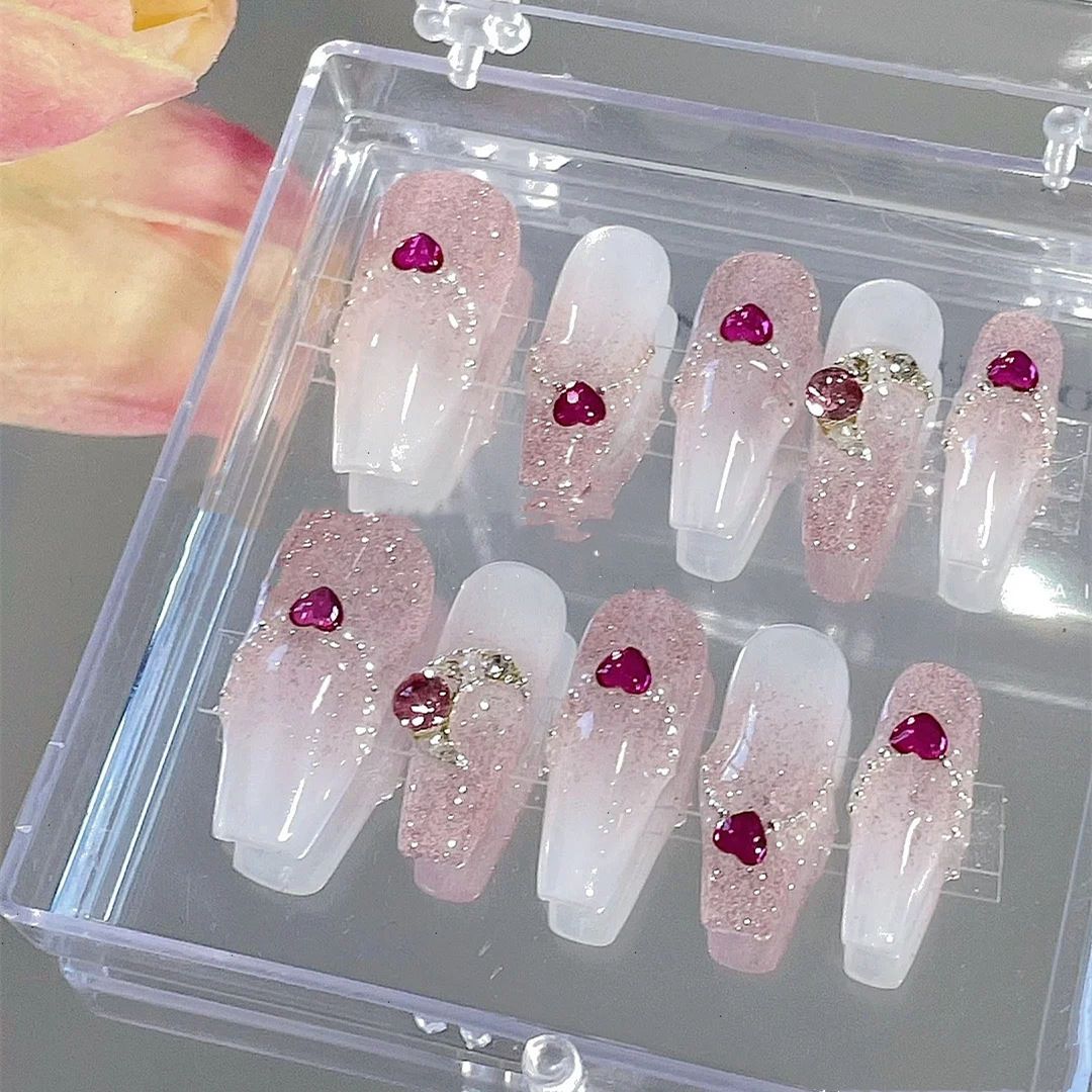 Handmade custom nails with small diamonds and cute hearts