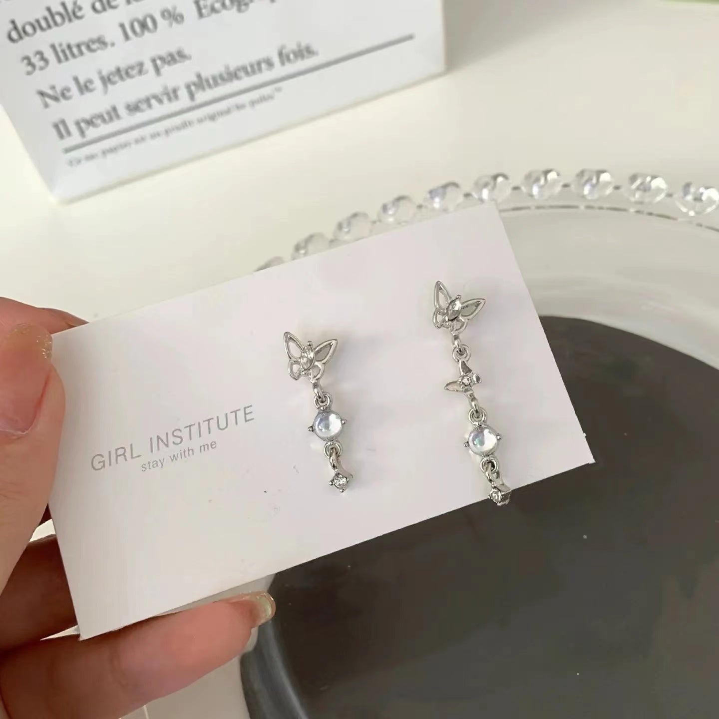 S925 silver pin asymmetric butterfly tassel earrings female South Korea light luxury niche design senior ear clip earrings