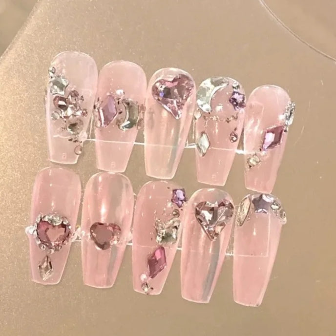 Artificial nails are worn by hand, showing white and pink French flash diamond rose lovers' manicure wedding nails are removable