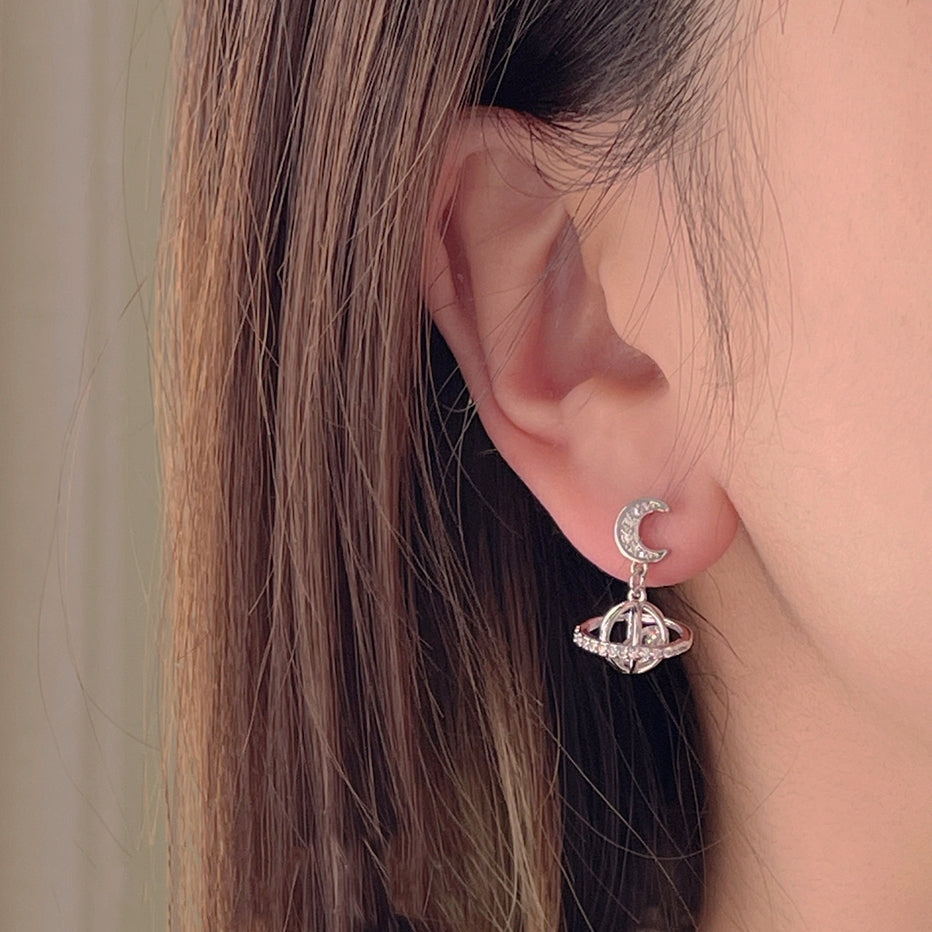 Asymmetrical sparkling stars and moons, three-dimensional micro-set zircon, exquisite and simple 925 silver earrings, female