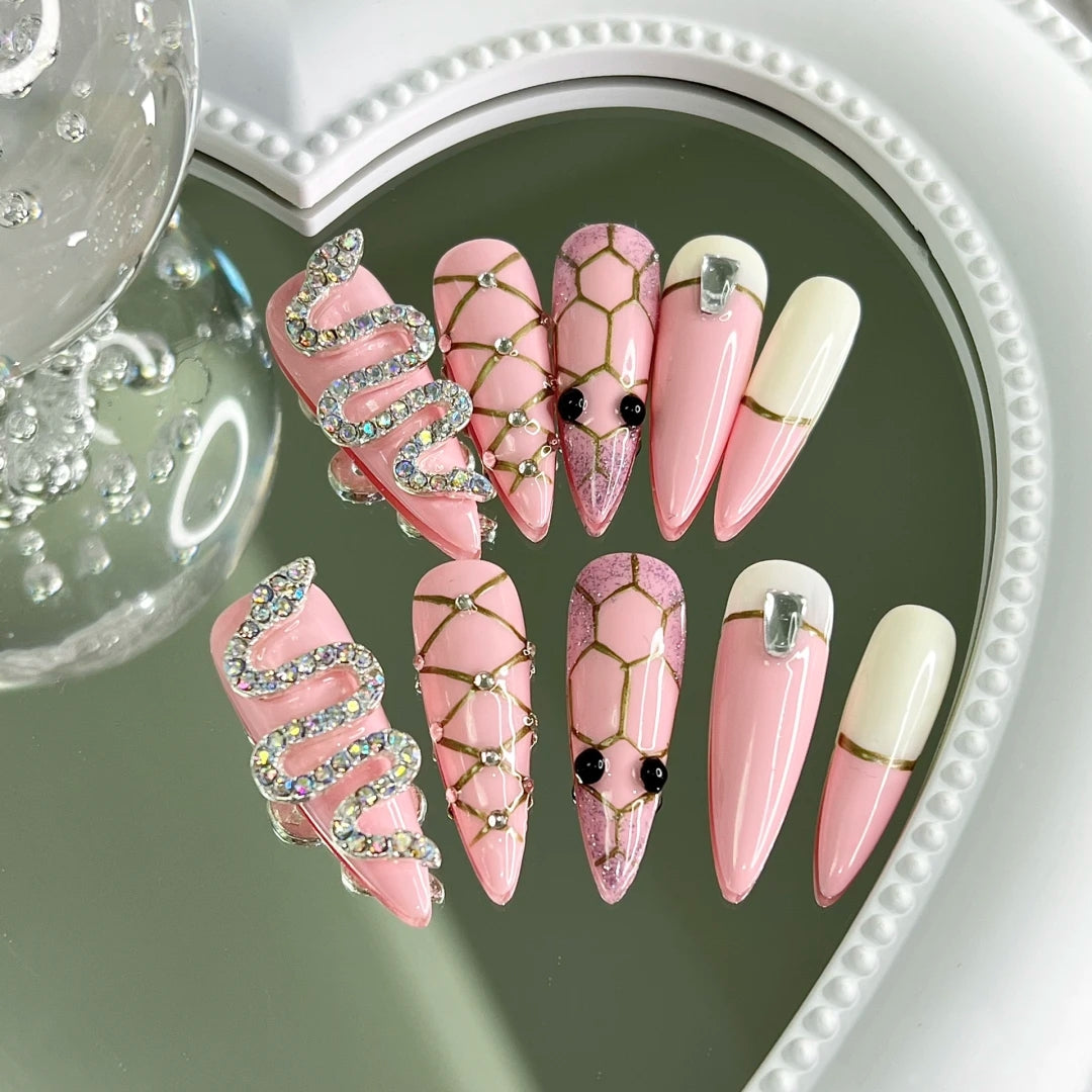 Wearing nail by hand, the finished patch shows white pink snake false nail, which can be worn by pregnant women and can be removed