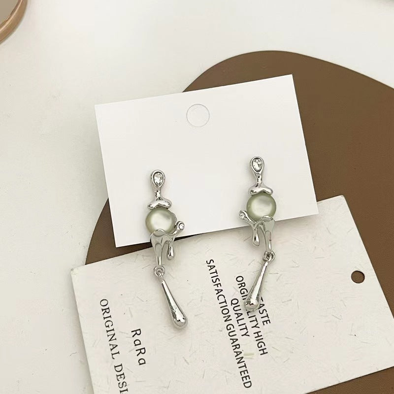 925 silver pin French cat's eye tassel niche design lava earrings long personalized aloof wind earrings female