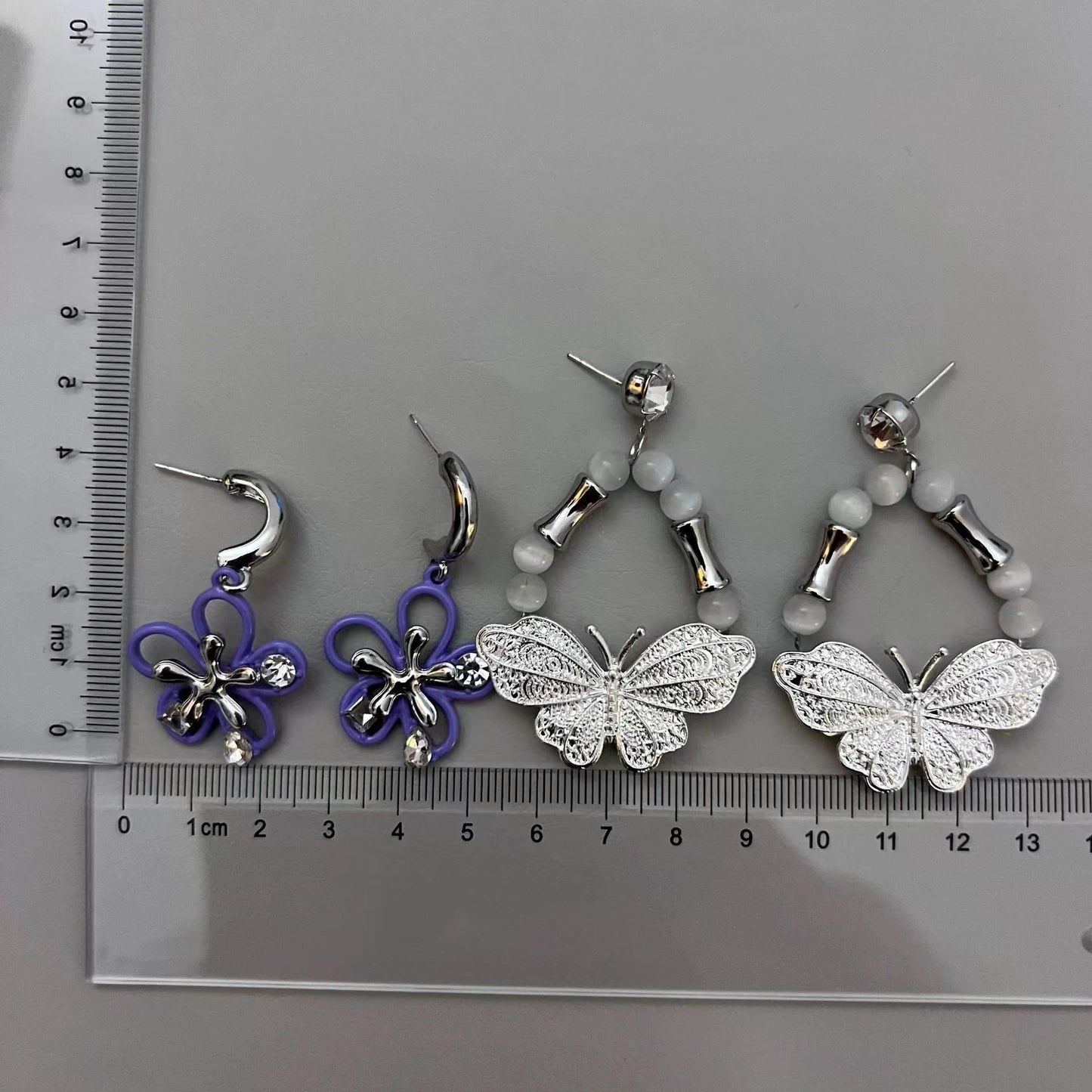Purple flower and White Butterfly Earrings