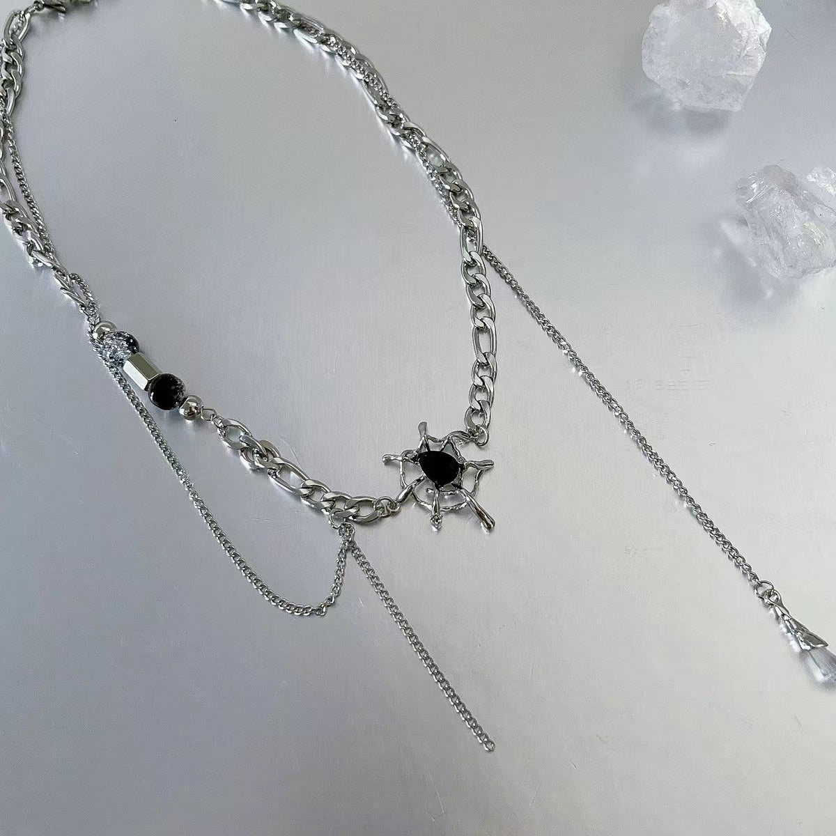Liquid spider web tassel necklace