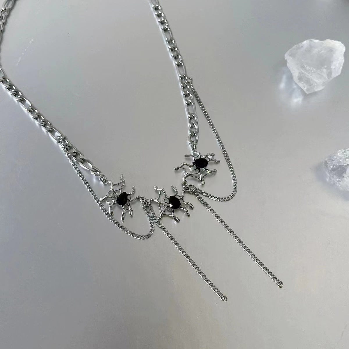 Liquid spider web tassel necklace
