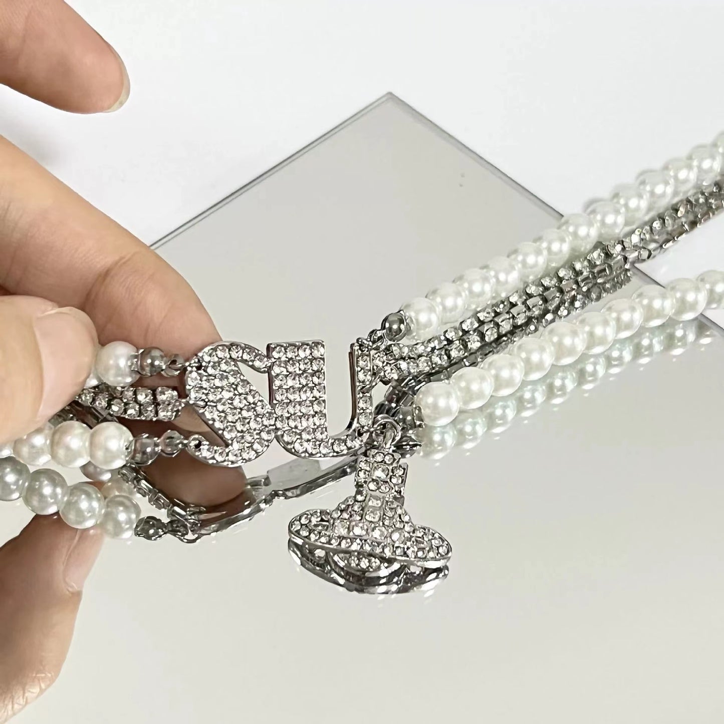 Fashionable multi-layered design sense sparkling diamonds Queen West planet pearl necklace