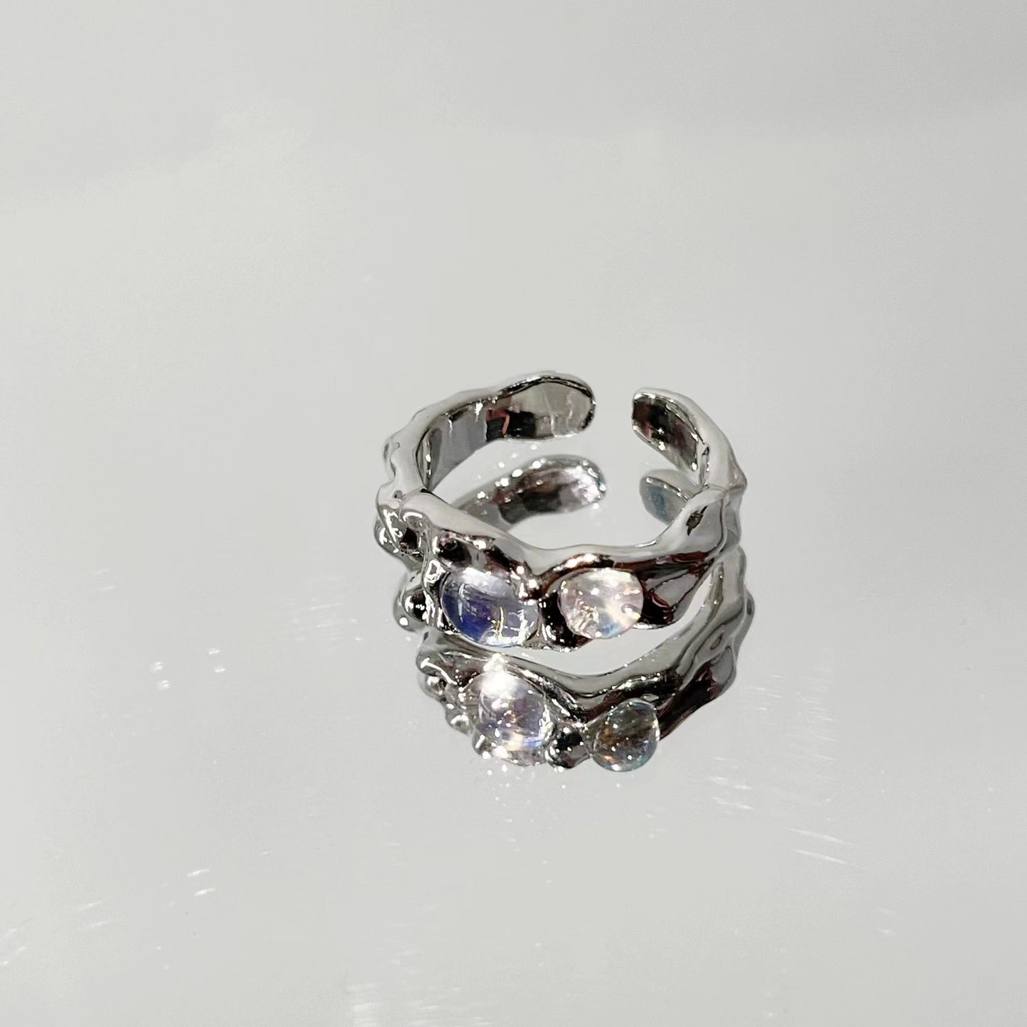 Zirconia and diamond geometric ruffle ring