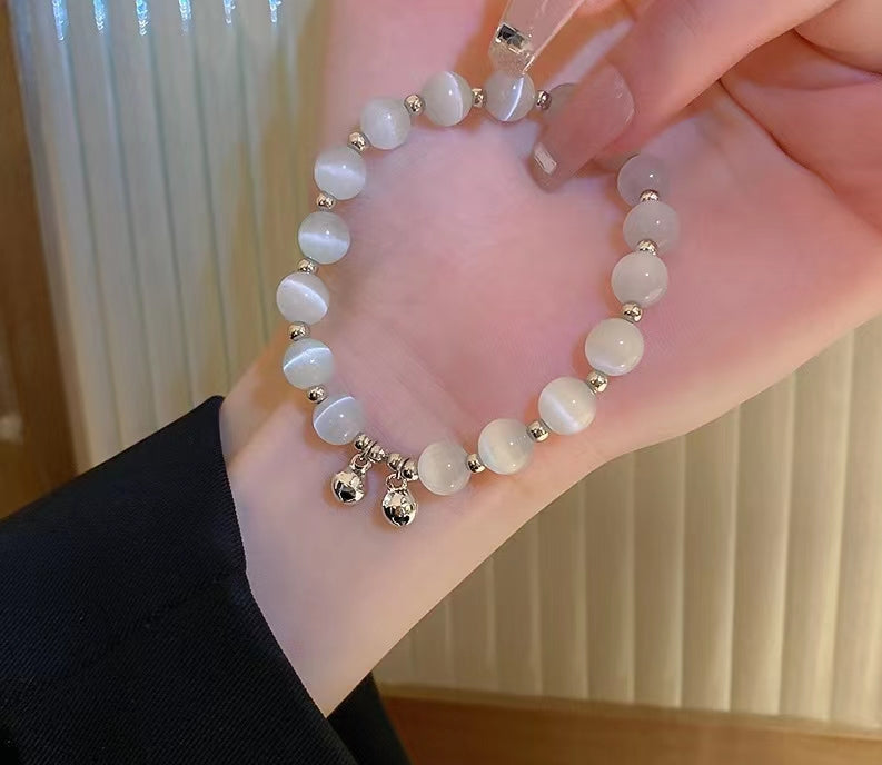 Cat's eye stone aubergine drop bracelet with diamonds