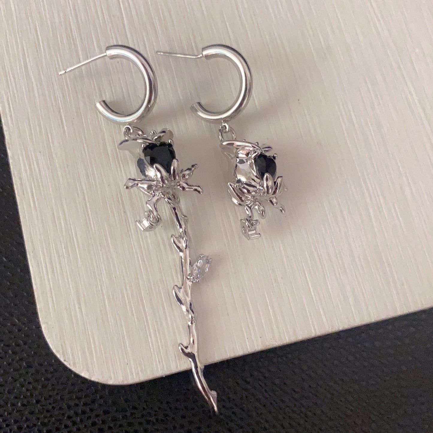 New asymmetric rose studded earrings cool