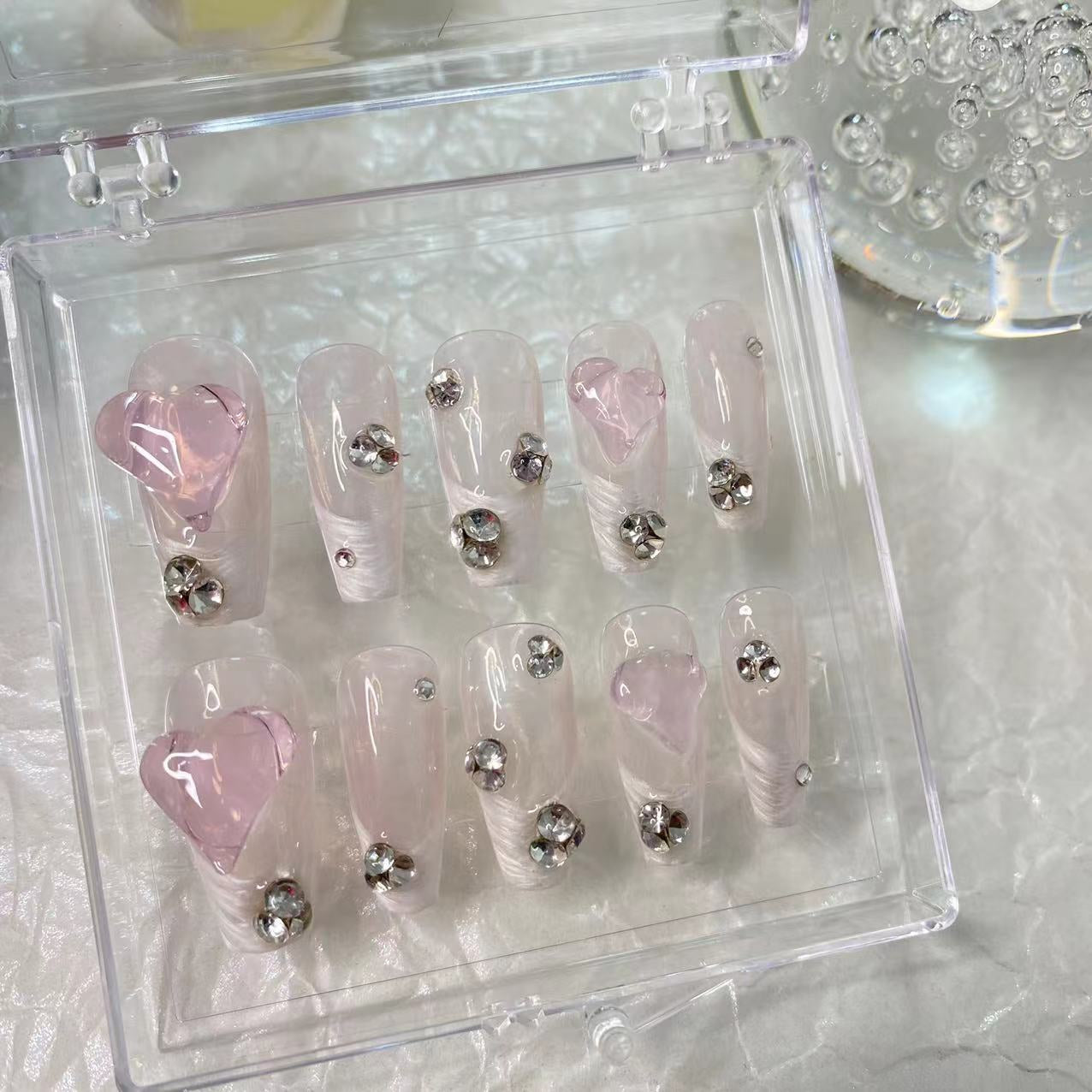 Hand wearing nail pile, drill pile, crooked heart, pure desire, pregnant women, students can use it, which can be disassembled, and it is convenient and quick